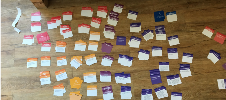 First printed version of the cards lying on the floor